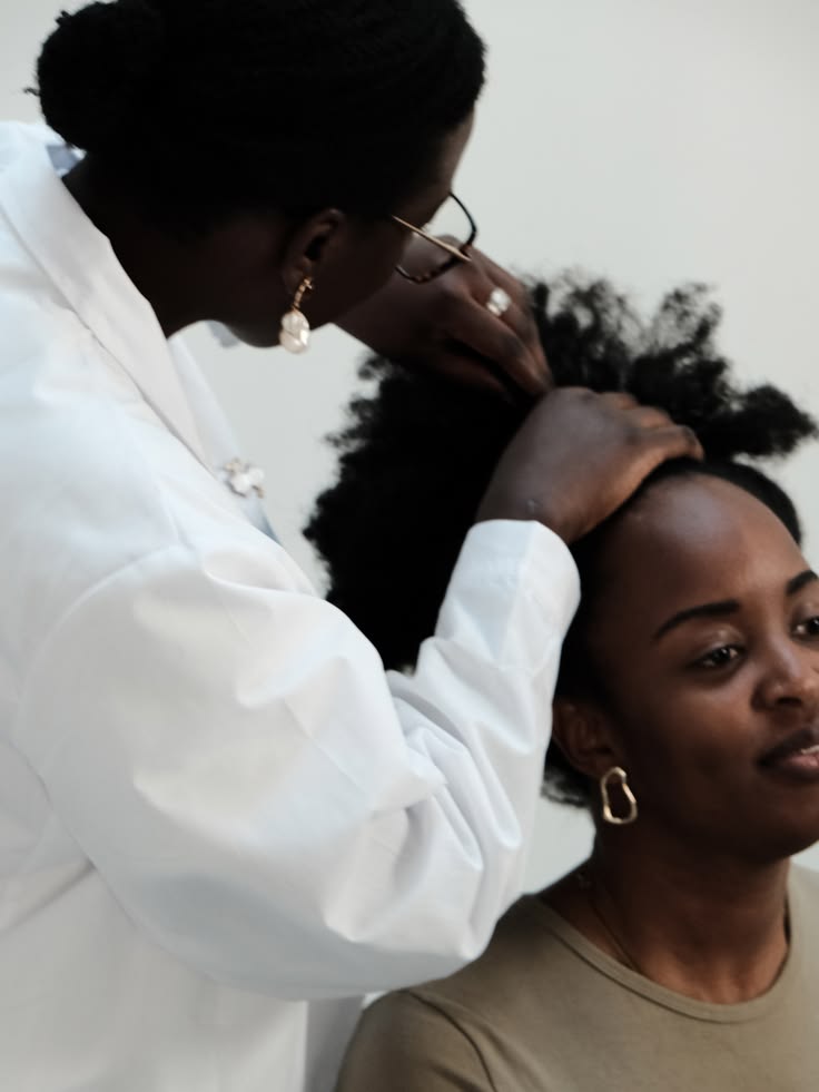 Dermatologist examining an itchy scalp