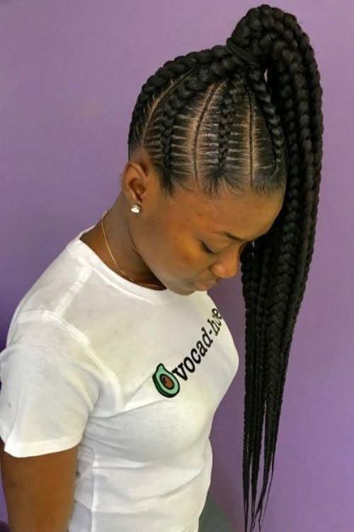 Natural 4C hair styled in a feed-in braid ponytail