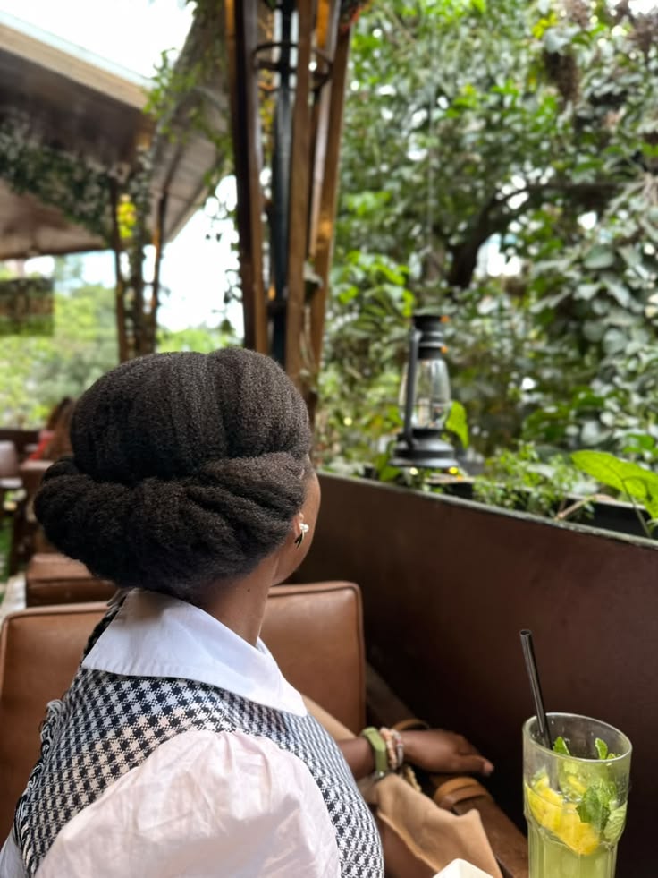 Quick five-minute tucked updo on natural 4C hair