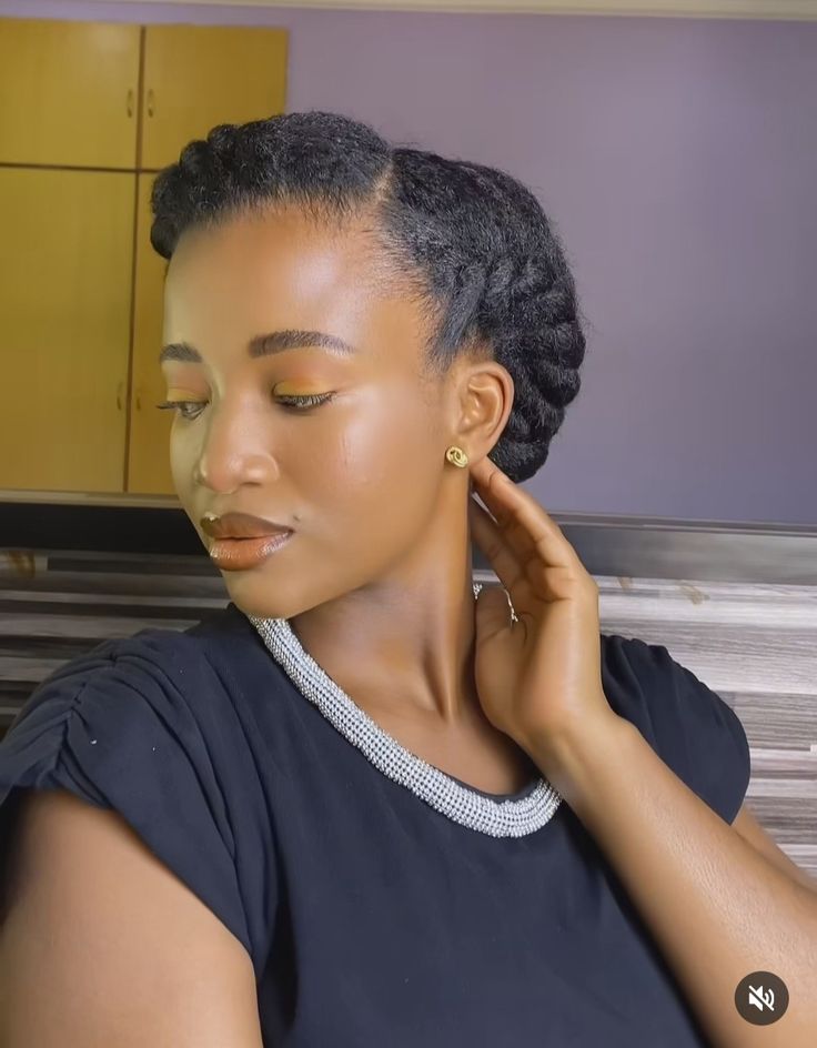 Natural 4C hair styled with a flat-twist crown