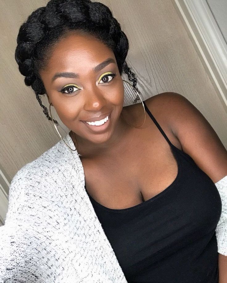 Natural 4C hair styled with a flat-twist headband