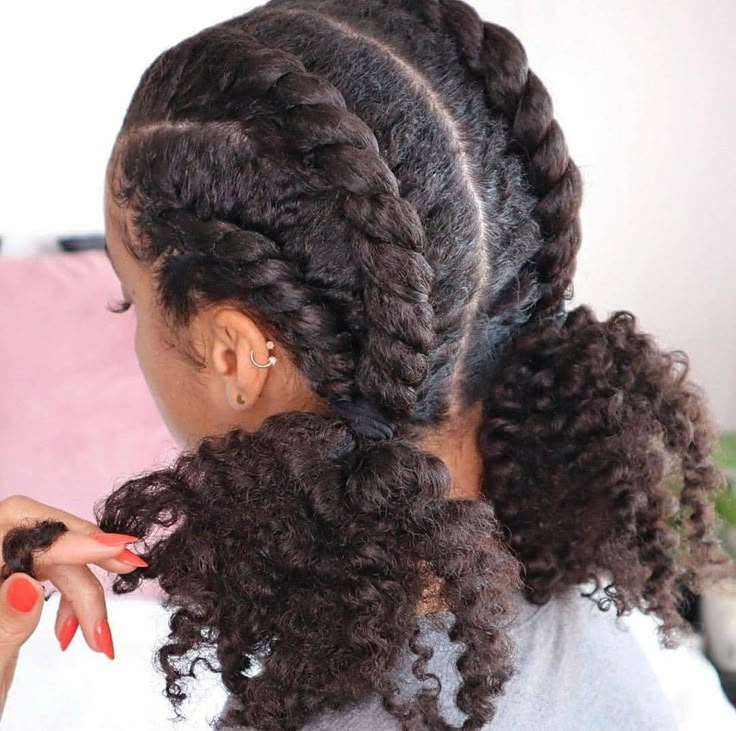 Flat-twist pigtails on natural 4C hair