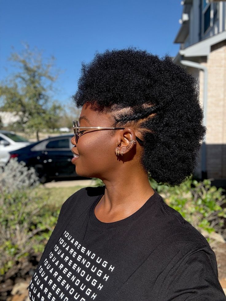 Bold frohawk hairstyle on natural 4C hair