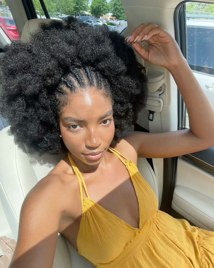 Natural 4C afro with small front braids