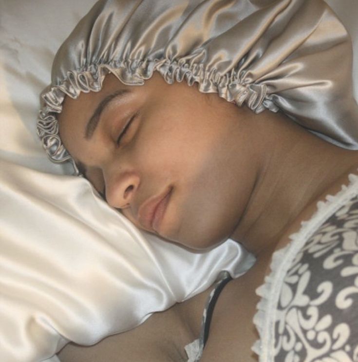 Satin bonnet protecting natural hairline during sleep