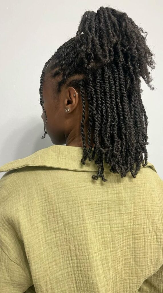 Natural 4C twists styled half up and half down