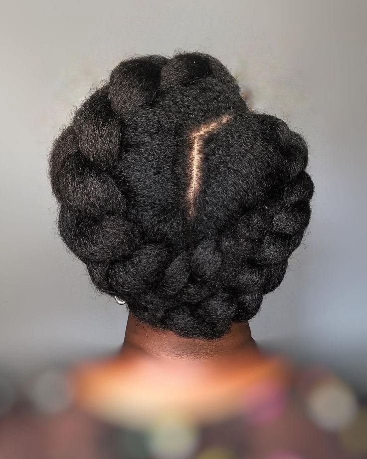 Natural 4C hair styled in a halo braid