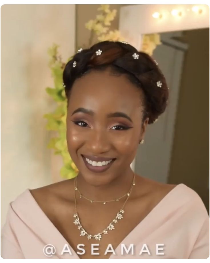 Halo braid with textured natural 4C hair for a wedding
