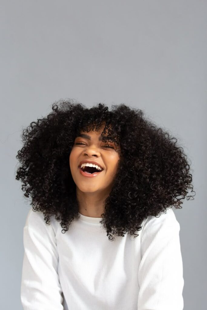 Healthy medium-porosity natural hair after following a consistent routine.