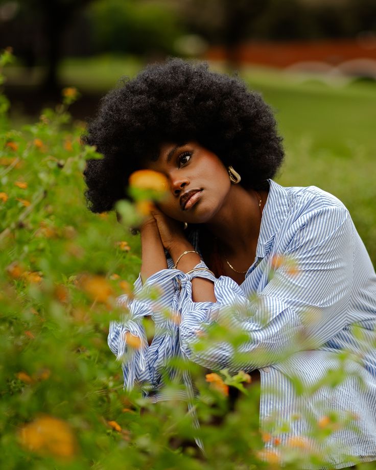 Woman with healthy natural hair during Harmattan
