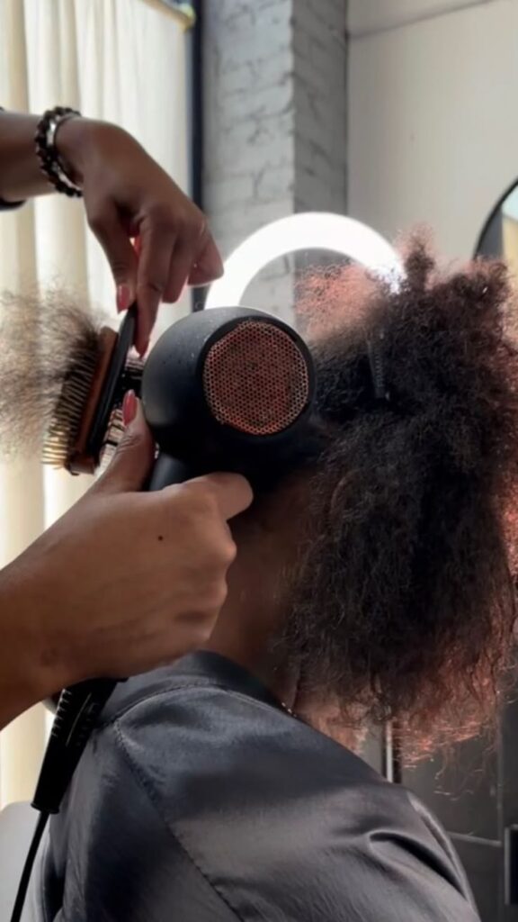 Heat styling natural hair with a blow dryer