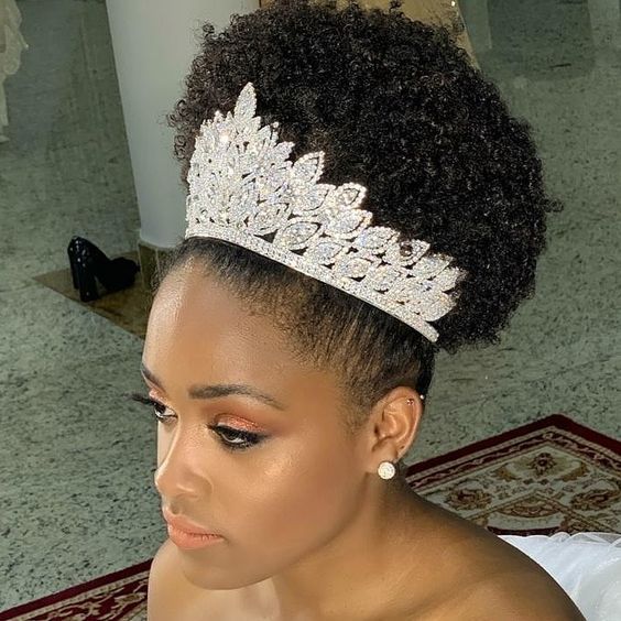 High afro puff with tiara on natural hair