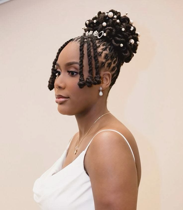 Black bride with elegant locs bridal hairstyle, sophisticated natural locs updo, delicate wedding accessories