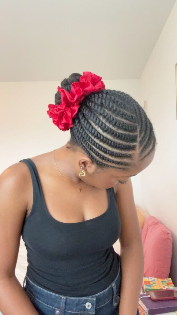 Protective low-manipulation hairstyle on healthy natural 4C hair.