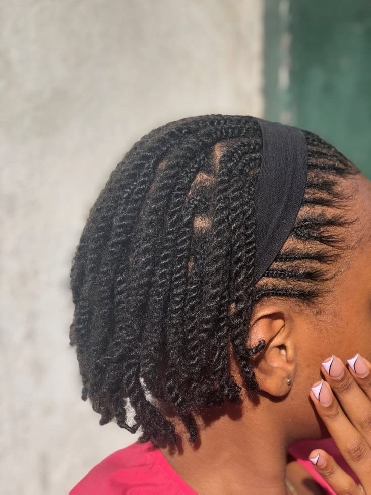 Natural hair in a low manipulation hairstyle