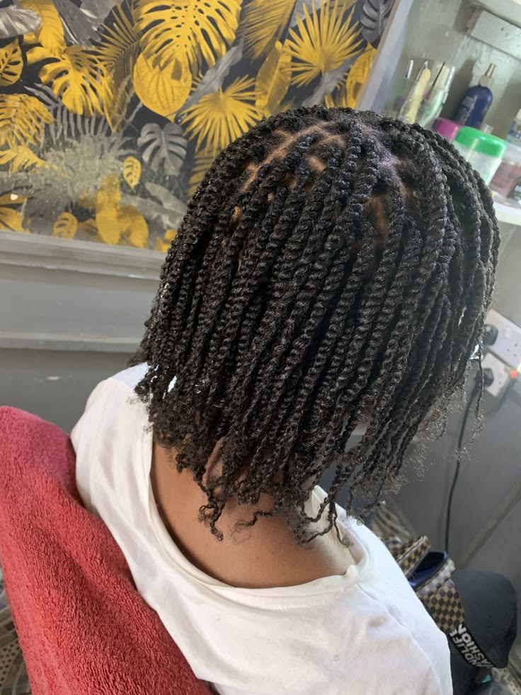 Medium protective two-strand twists on natural 4C hair