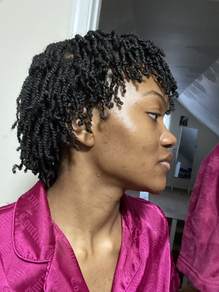 Natural 4C hair styled in small mini twists