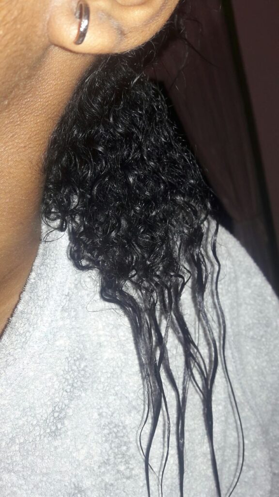 a well moisturized new growth in transitioning hair