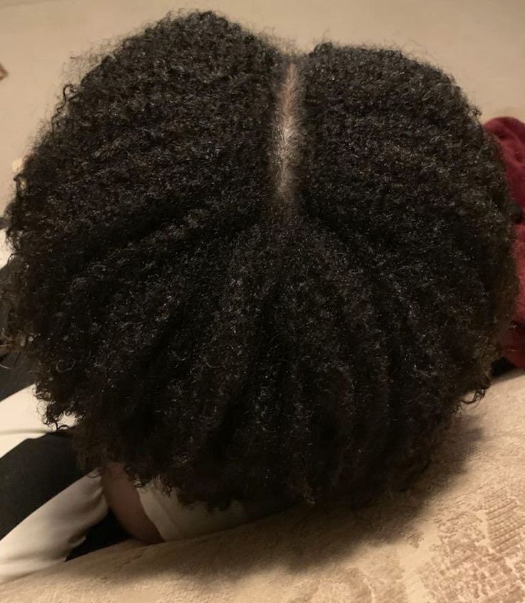 Leave-in conditioner absorbed evenly into medium-porosity 4C hair.