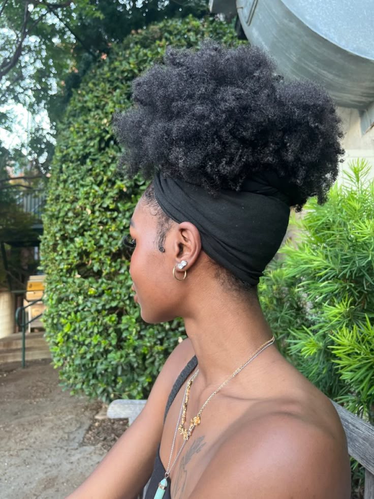 Natural 4C puff styled with a scarf