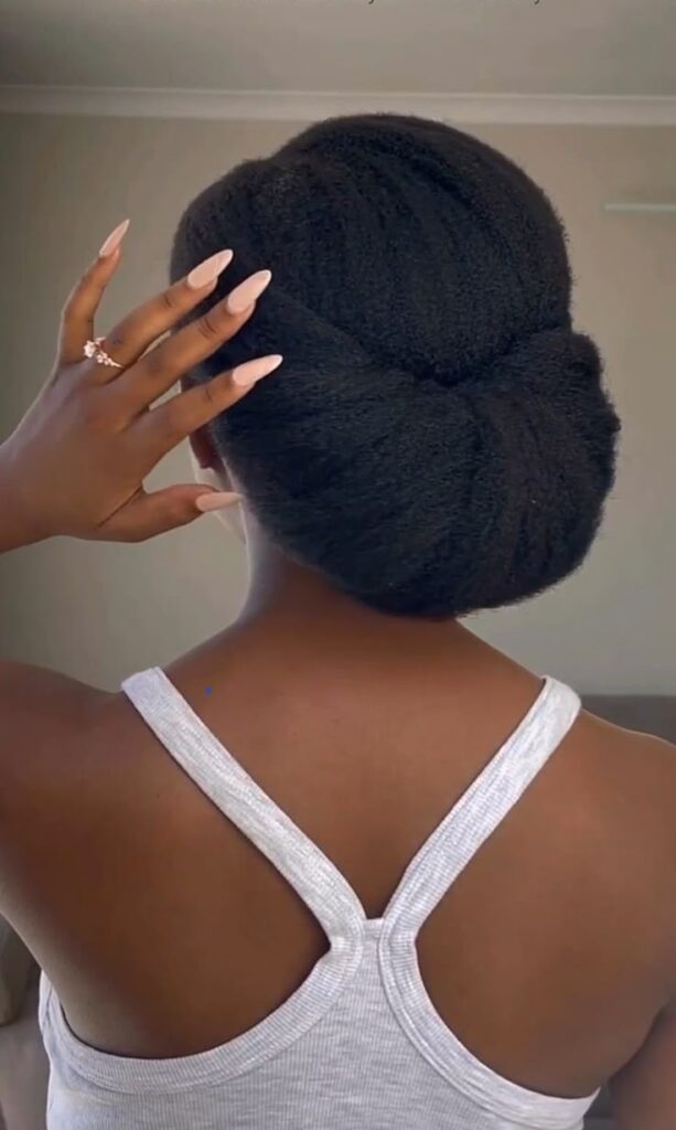 Rolled updo on natural 4C hair