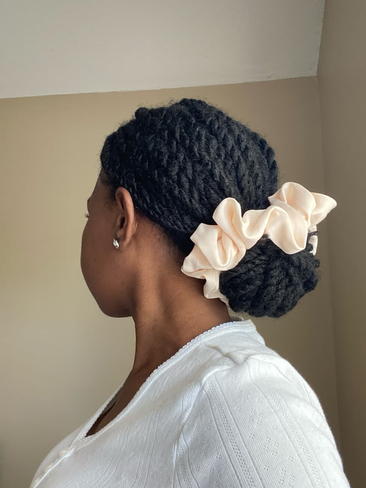  Rope twists arranged into a bun on natural 4C hair