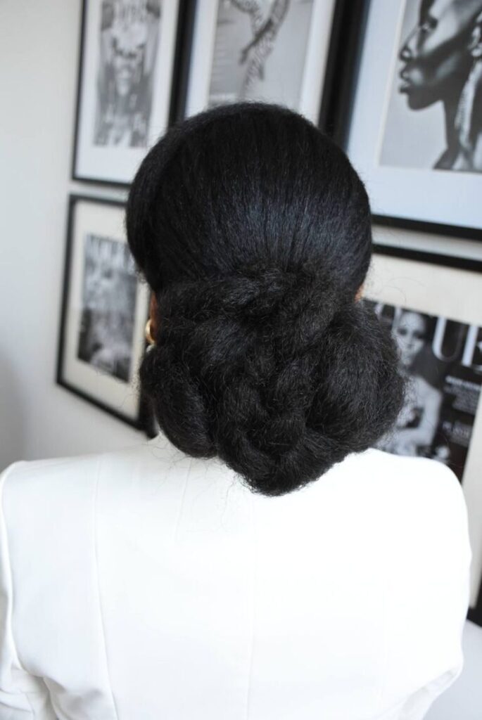Sculpted low afro bun on natural 4C hair