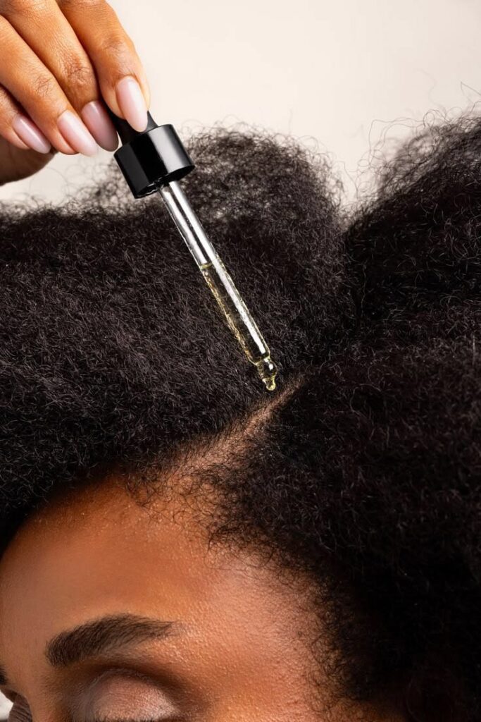woman sealing in moisture with oil