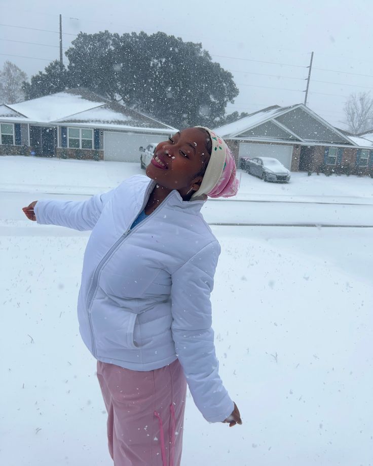 black woman protecting her hair during winter