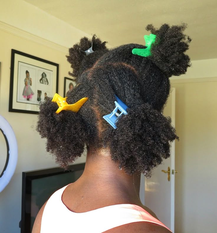 Natural 4C hair divided into sections for washing