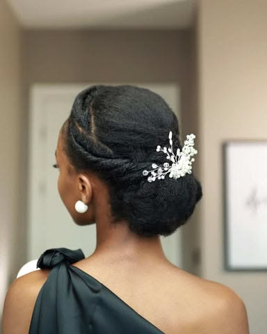 Side bun with decorative comb on natural 4C hair