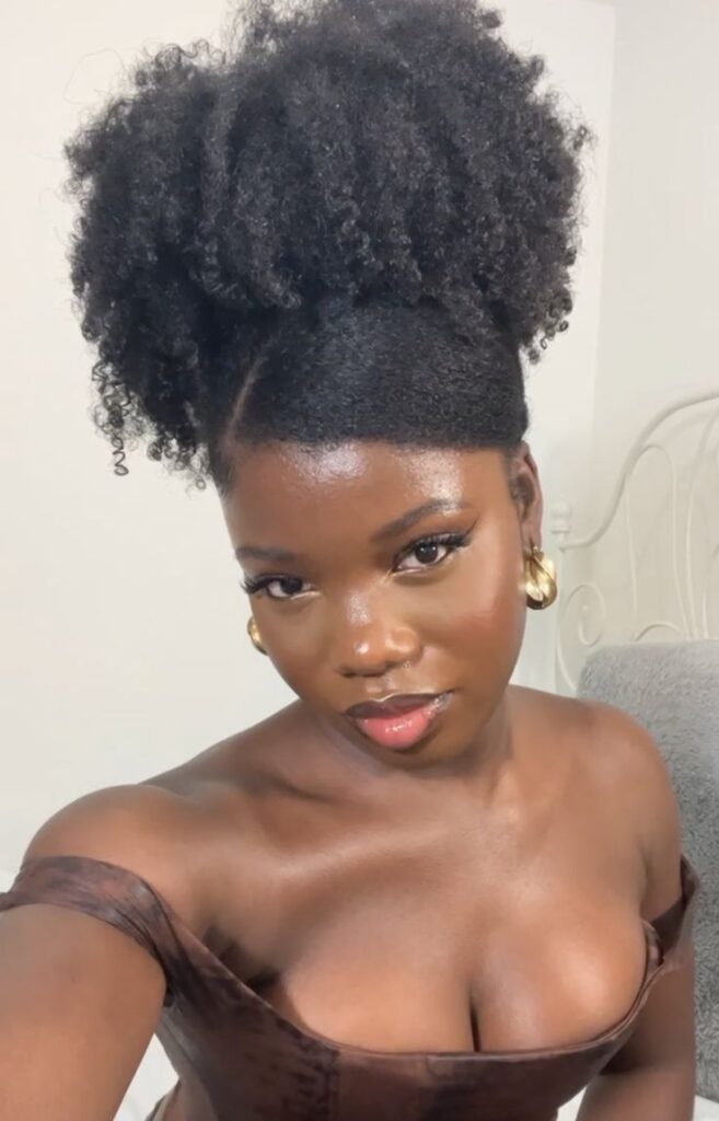Side-parted afro puff on natural 4C hair