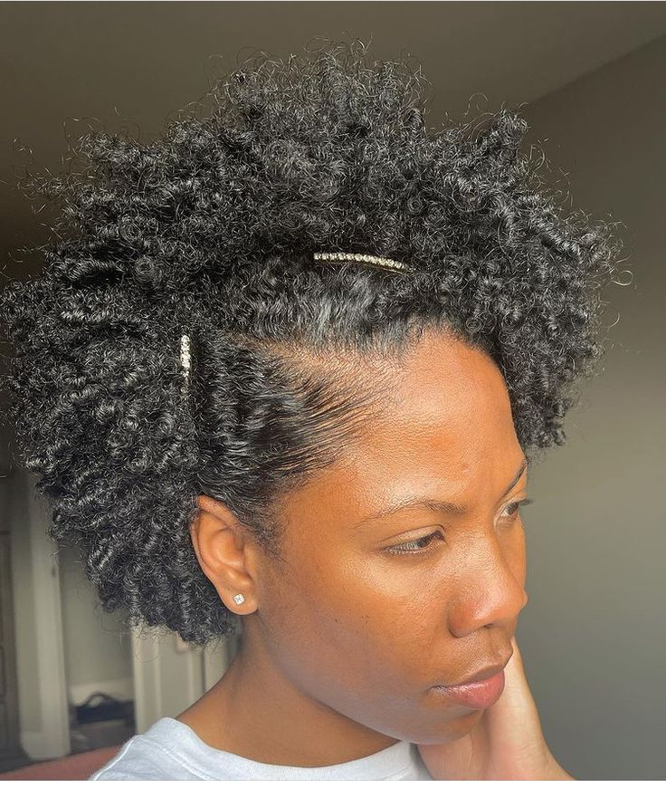 Natural 4C afro pinned to one side