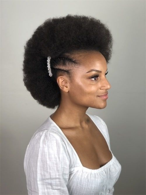 Side-swept natural 4C afro wedding hairstyle