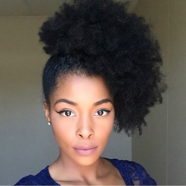  Side-swept afro on natural 4C hair