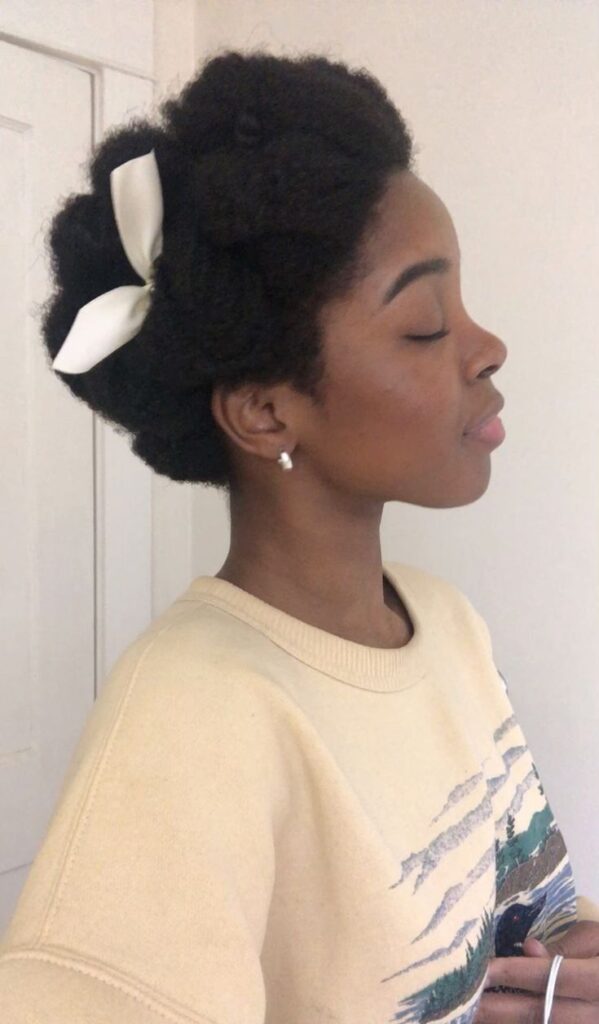 Side-tucked updo on natural 4C hair