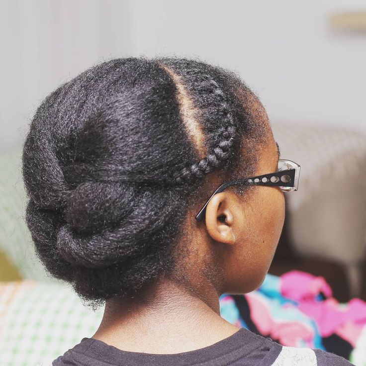 Simple tucked protective hairstyle on natural 4C hair