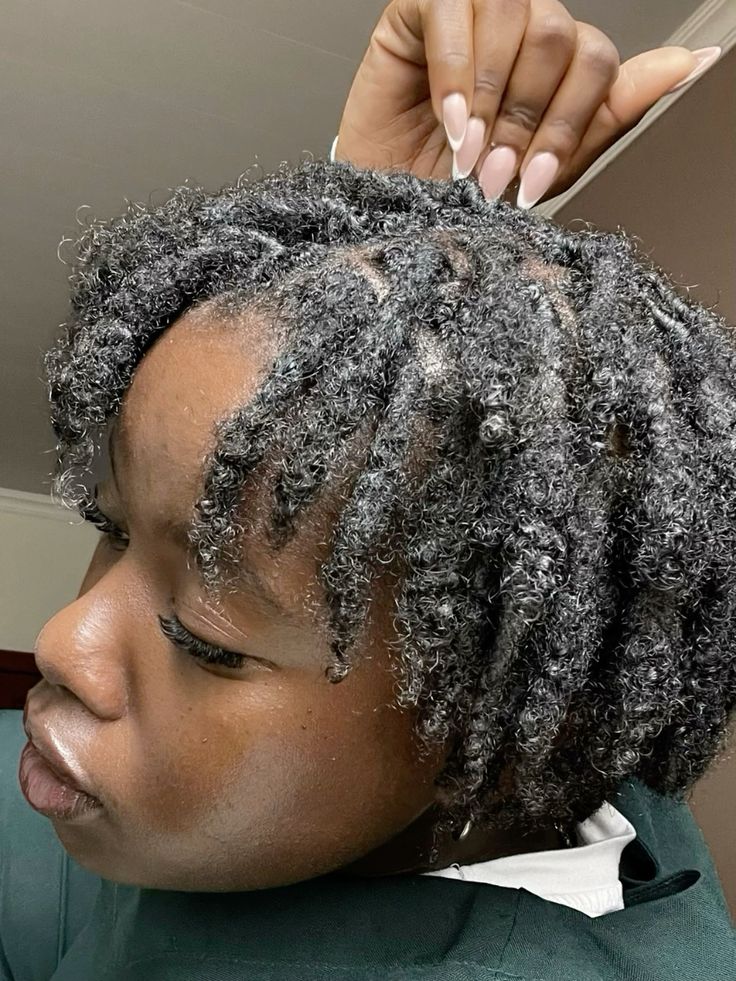 Starter locs showing slight unraveling after washing on natural 4C hair.