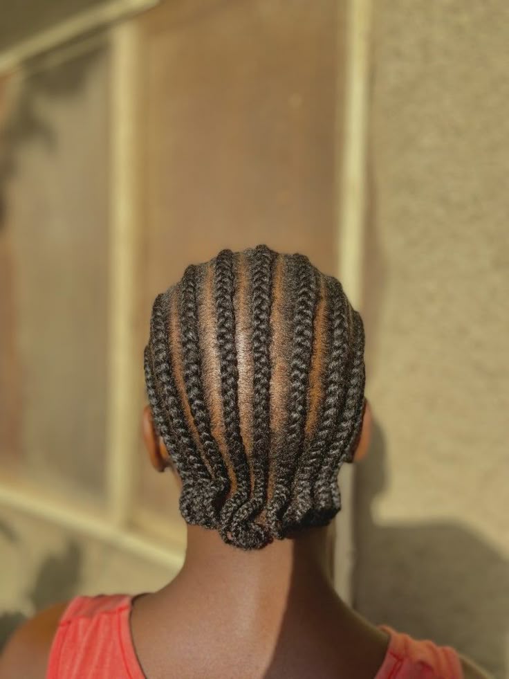 Protective straight-back cornrows on natural 4C hair
