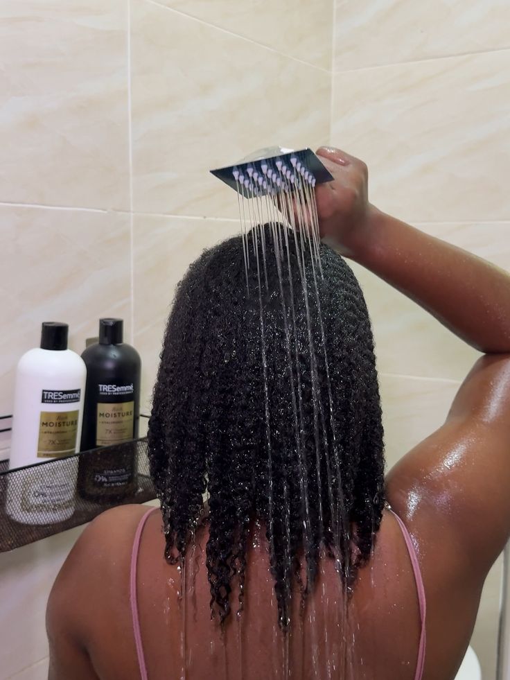 Natural hair being prepared for wash day after swimming