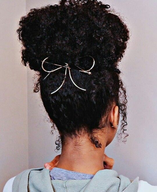 Natural 4C textured high bun decorated with accessories