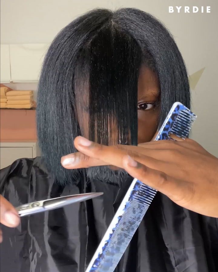 trimming the ends of natural 4C hair.