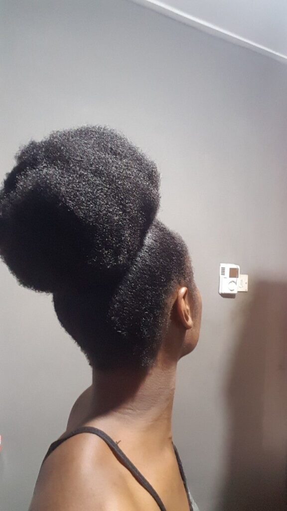 Tucked afro updo on natural 4C hair