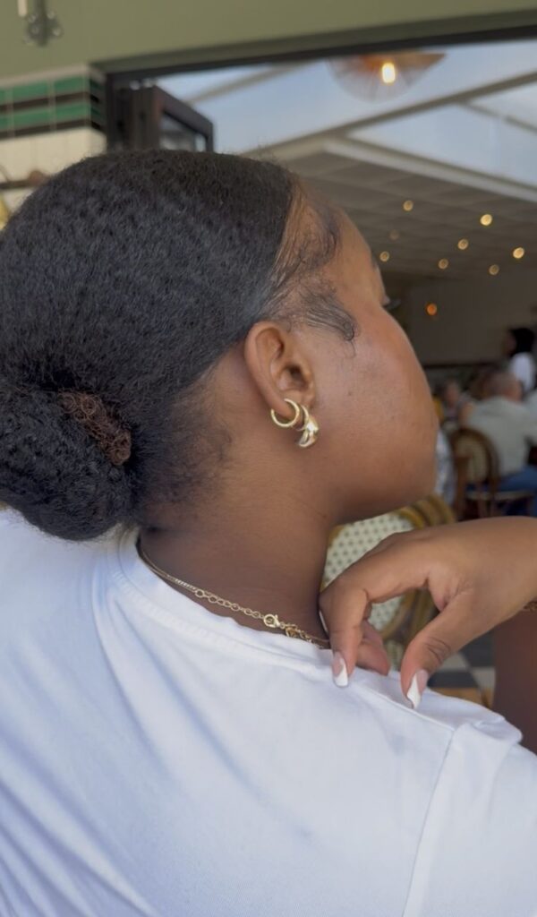 Tucked side bun on natural 4C hair