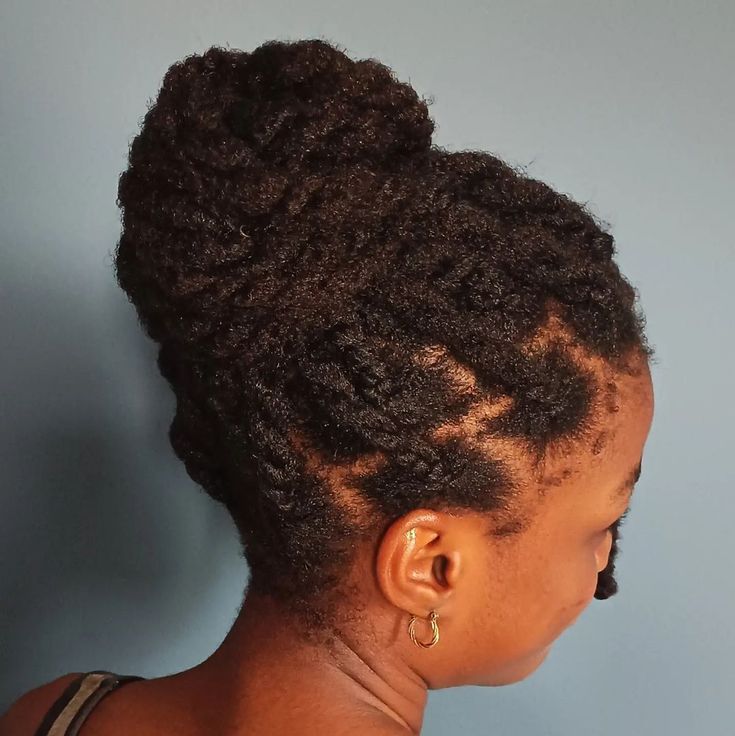 Tucked twist updo on natural 4C hair