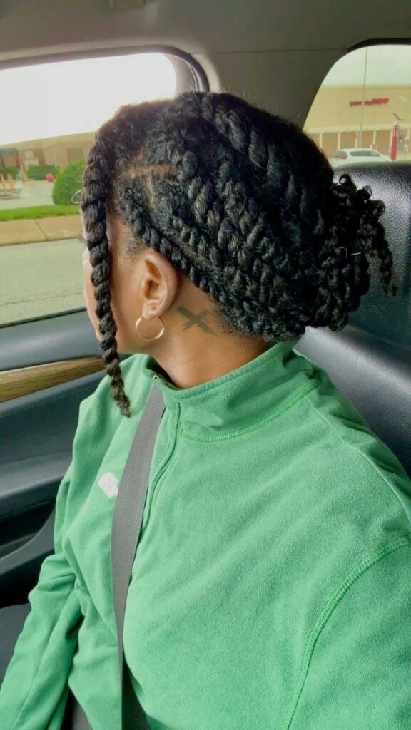 Twist-and-tuck updo on natural 4C hair