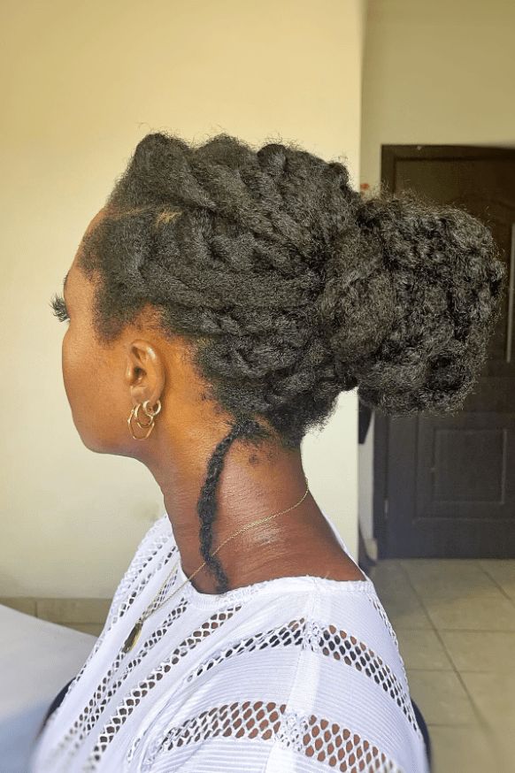 Twist-and-tuck updo on natural 4C hair