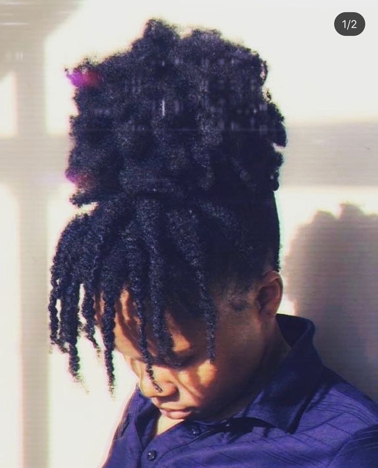 Natural 4C hair styled with twisted bangs