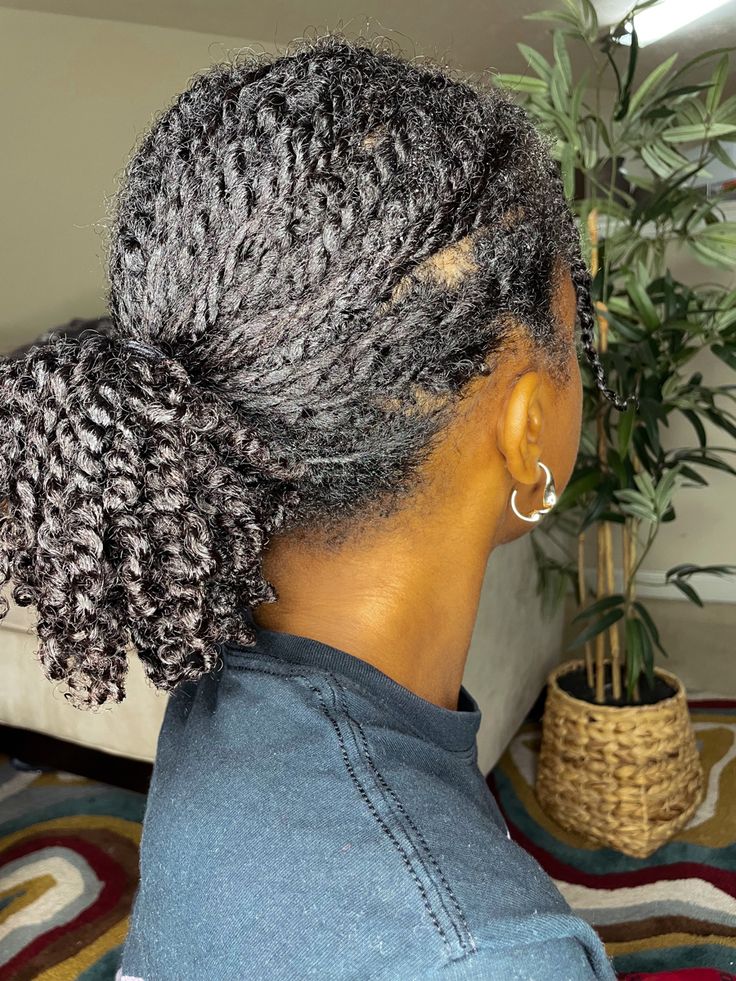 Two-strand twists gathered into a ponytail