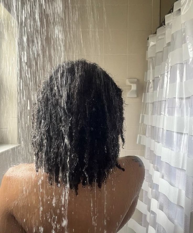 woman wetting her hair before swimming